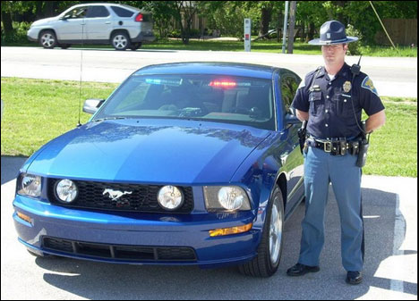unmarked mustang police car